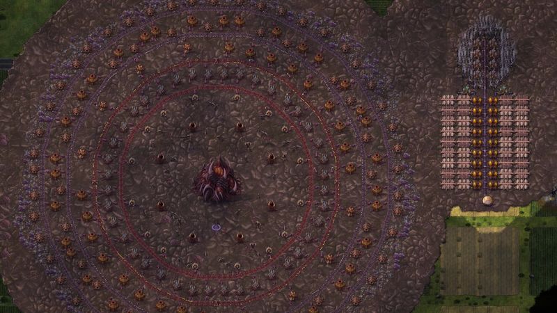 A circular hive spreading over farmland seen from above.